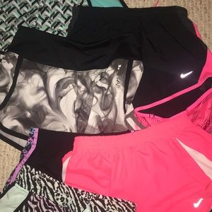 7 pairs of Nike and Justice shorts size 7/8 girls